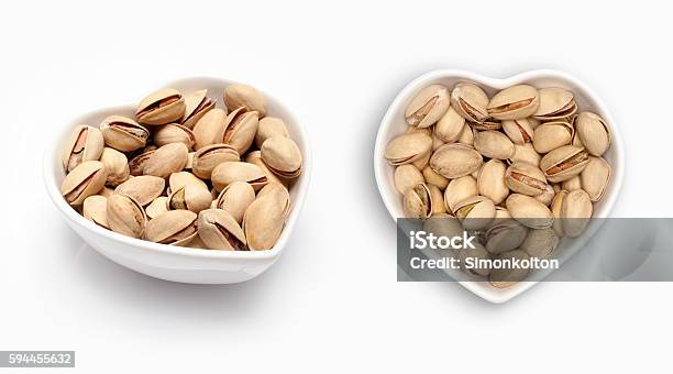 Pistachio In A Heart Shaped Bowl Stock Photo - Download Image Now - Bowl, Cashew, Cooking