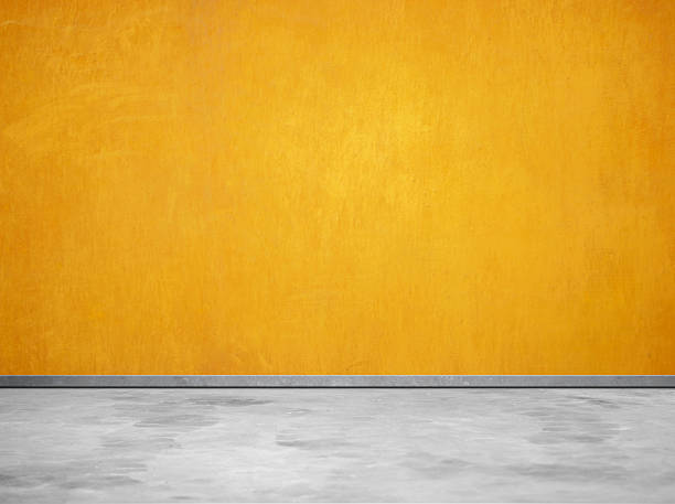 istock Empty street yellow wall and sidewalk 594455922