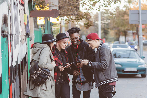 istock Multi ethnic friends outdoors on city street 594458040