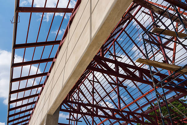 istock roof under construction for home building 594458172