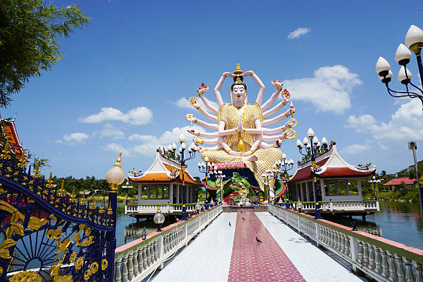 istock Buddhist Guan Yin statue at Plai Laem temple 594458630