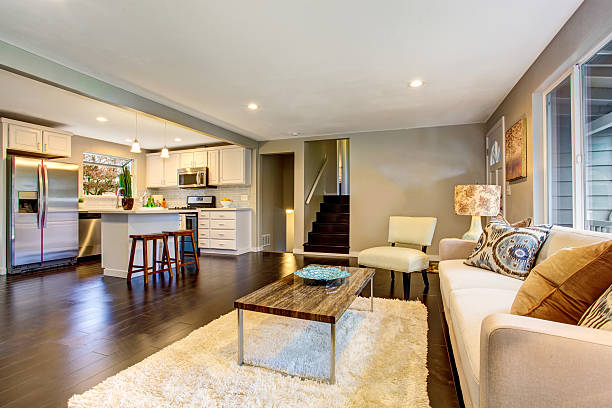 istock Open floor plan. Cozy living room interior connected to kitchen. 594459572