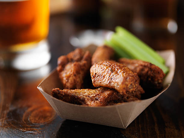 istock paper tray with buffalo chicken wings 594460606