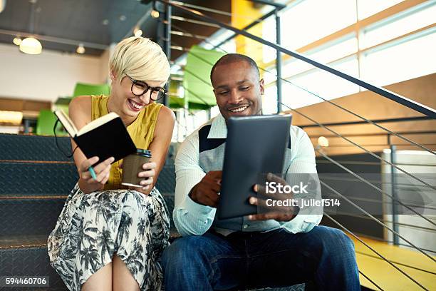 Two Creative Millenial Small Business Owners Working On Social Media Stock Photo - Download Image Now