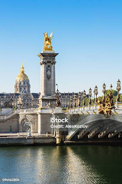 Alexandre Iii Bridge With Hotel Des Invalides Paris France Stock Photo - Download Image Now