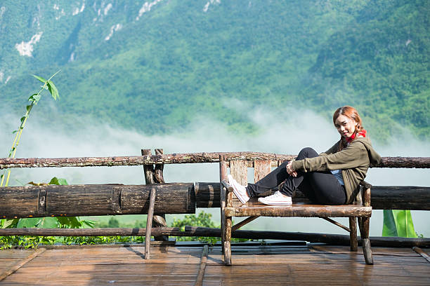 istock Smiling young woman With  Montains Background 594463368