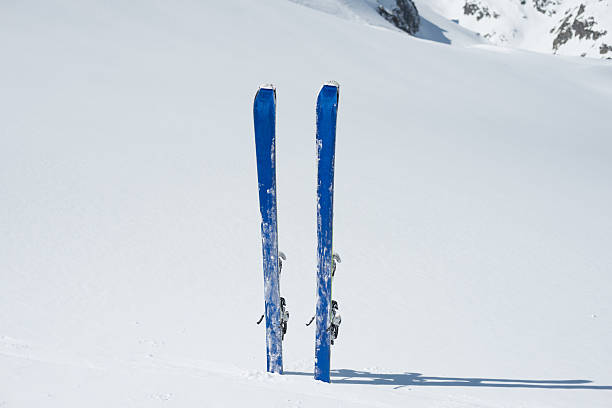 istock Skis planted in the snow 594463890