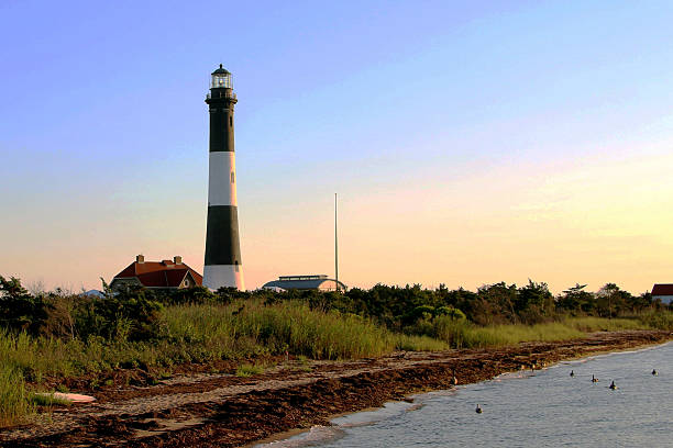 istock Fire Island Lighthouse taken from the boardwalk at dusk 594464314