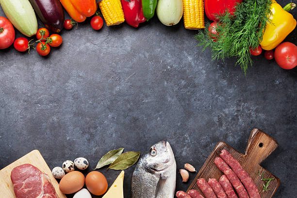 istock Vegetables, fish and meat cooking 594464598