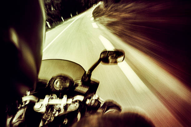 istock Bike riding fast seen from passenger seat 594464774