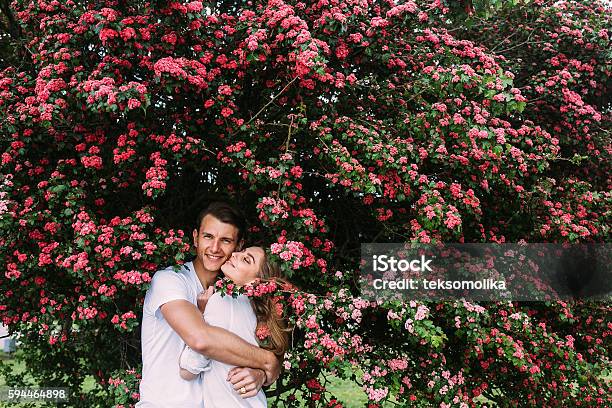 Young Happy Couple In Love Outdoors Stock Photo - Download Image Now - Adult, Arts Culture and Entertainment, Beautiful People