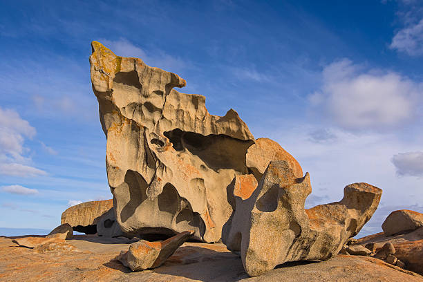 Remarkable Rocks at Flinders Chase National Park, Kangaroo Island Remarkable Rocks, natural rock formation covered by golden orange lichen at Flinders Chase National Park. One of Kangaroo Island's iconic landmarks, South Australia flinders chase national park stock pictures, royalty-free photos & images