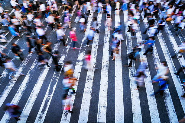istock zebra crossing in the Osaka, motion blurred people 594467902