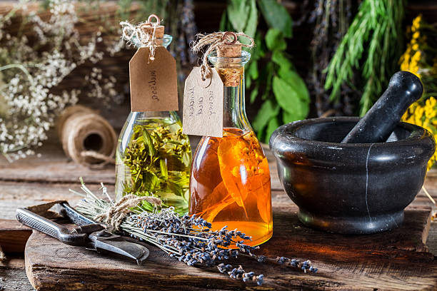 istock Tincture with herbs in bottles as an homemade cure 594468090