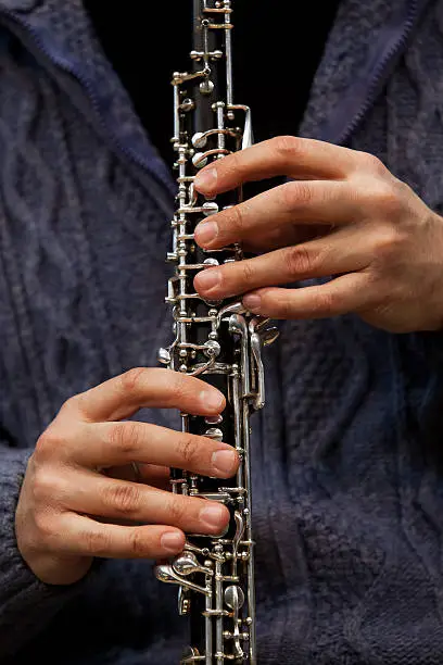 Photo of Hands musician playing the oboe