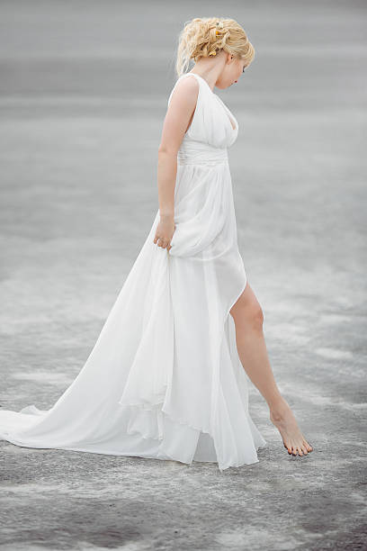 istock Beautiful bride outdoors in a desert. 594470250