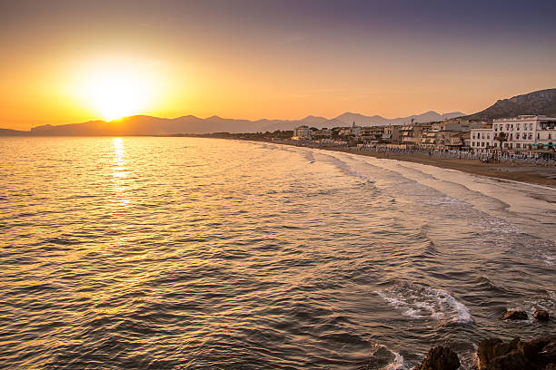 istock sunset on the beach of Sperlonga, Italy 594470478