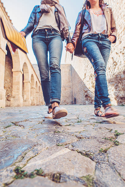 istock Woman walking down the street 594471494
