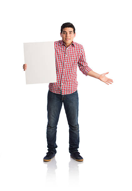 istock Young man holding sign and shrugging 594472702