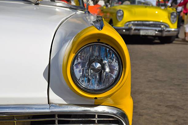 istock Headlight in a classic American car 594473338
