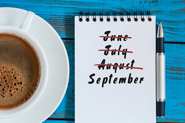 istock September beginning and summer end concept written at notepad with 594474044
