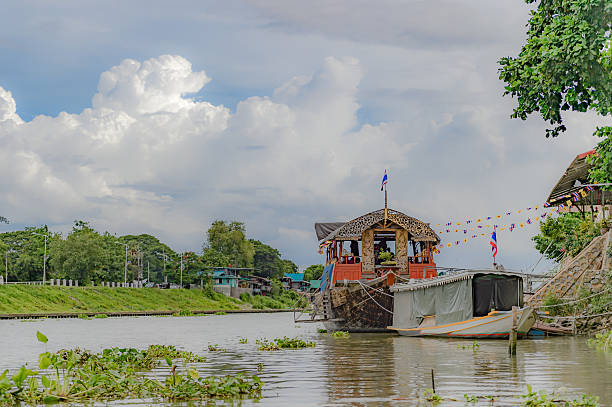 istock Restaurant on local wood cruise, floating over the River 594474204