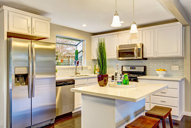 istock Modern kitchen room interior with white cabinets, stainless steel 594474234