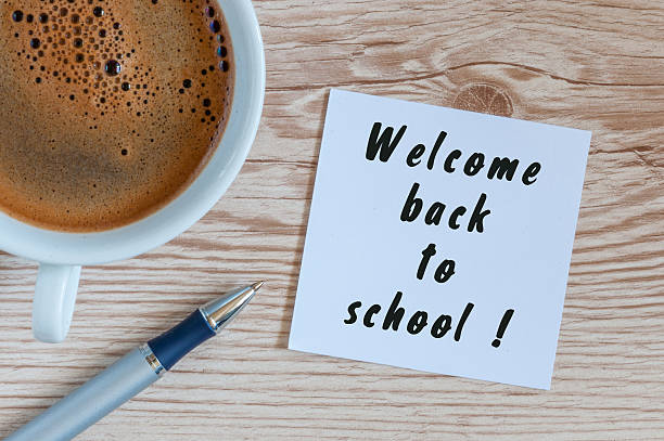 istock Welcome back to school. September beginning concept written at notepad 594475988