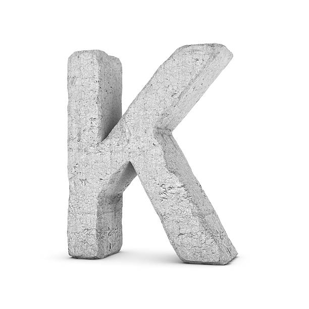 istock Concrete letter K isolated on white background 594476028