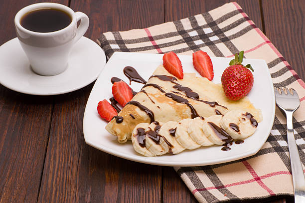 istock Crepes with Banana and strawberries 594477914