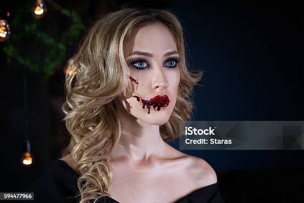 Woman With Halloween Make Up And Bloody Face Art Stock Photo - Download Image Now - Adult, Adults Only, Aggression