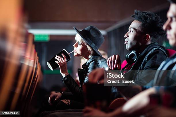 Multi Ethnic Young People In The Movie Theater Stock Photo - Download Image Now - Adult, African Ethnicity, African-American Ethnicity