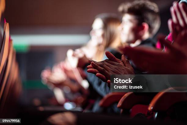 People In The Theater Close Up Of Clapping Hands Stock Photo - Download Image Now - Theatrical Performance, Movie Theater, Audience