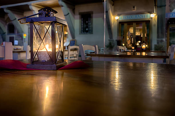 istock Candle in street cafe 594480816