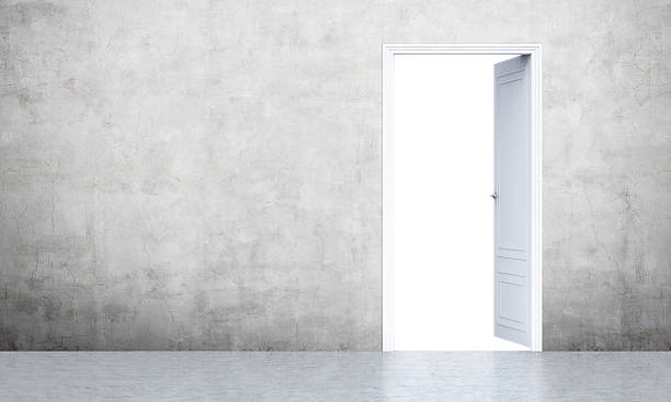 istock Open door in concrete room 594483074