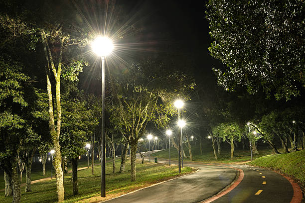 istock urban park at night with lights 594483122