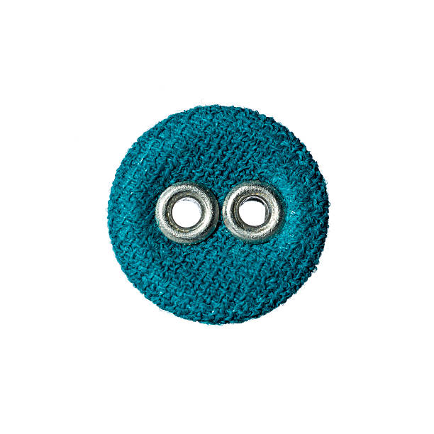 istock round button with two holes made of fabric 594484048