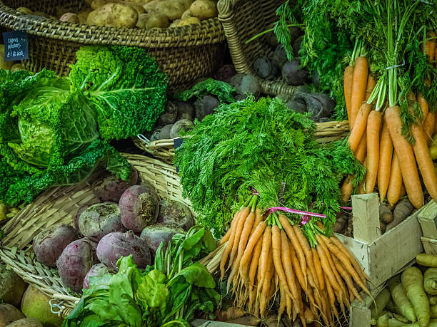 Fresh vegetables in boxes on sale