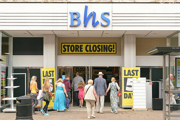People enter BHS store stock photo