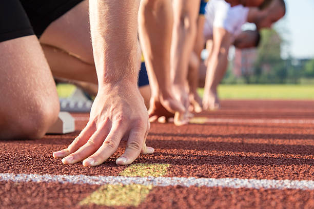 istock Male athletes at starting line 594492062