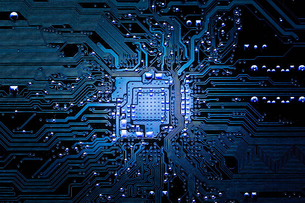 closeup electronic circuit board - elektronica industrie fotos stockfoto's en -beelden