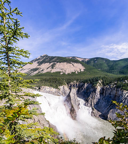 Virginia Falls - South Nahanni river, Canada 96 m drop of Virginia Falls - South Nahanni river, Northwest Territories, Canada with small rainbow wildlife reserve stock pictures, royalty-free photos & images