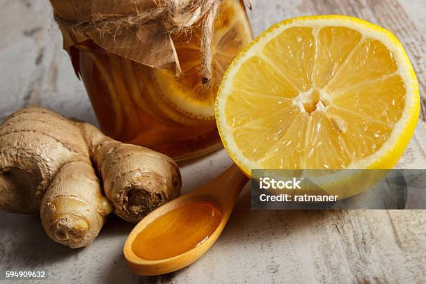 Fresh Lemon Honey And Ginger On Wooden Table Healthy Nutrition Stock Photo - Download Image Now