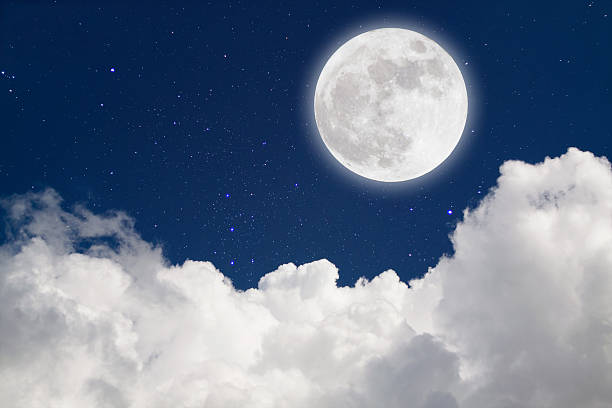 istock Romantic Moon In Starry Night Over Clouds. 594911916