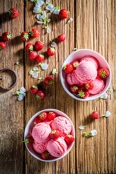 istock Homemade strawberries ice cream with mint leaves 594913624