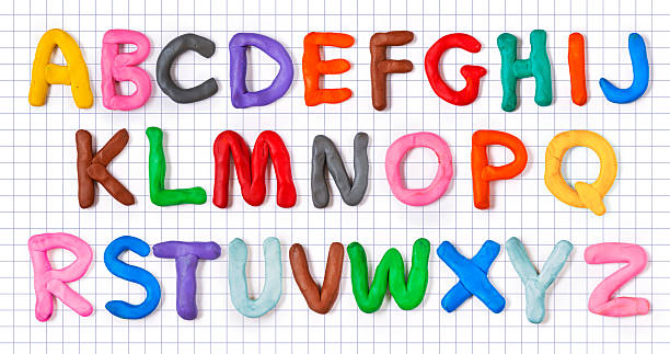 handmade plasticine alphabet with shadow on notebook sheet. - clay imagens e fotografias de stock