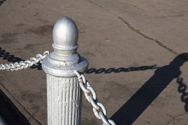 istock fence of river port 594917966