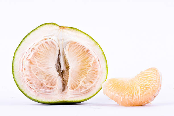 istock fresh pomelos peeled  and half pomelos 594922336