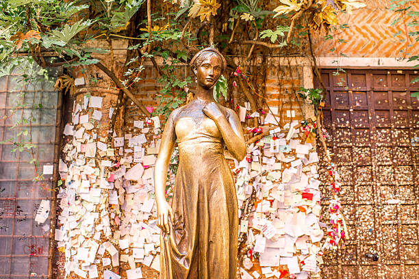 Verona, Italy - May 22, 2016: Juliet statue in Verona city. Romeo and Juliet is a tragedy written by William Shakespeare.