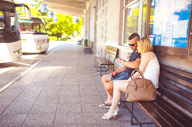 istock Young Couple Waiting the Bus 594924188